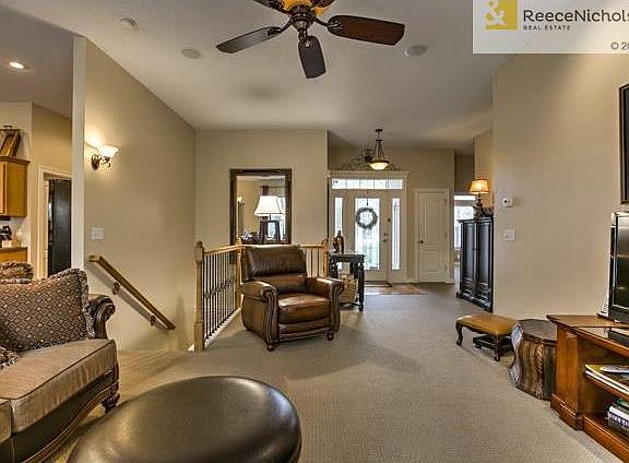 Great Room has surround sound, fireplace and is open to kitchen.