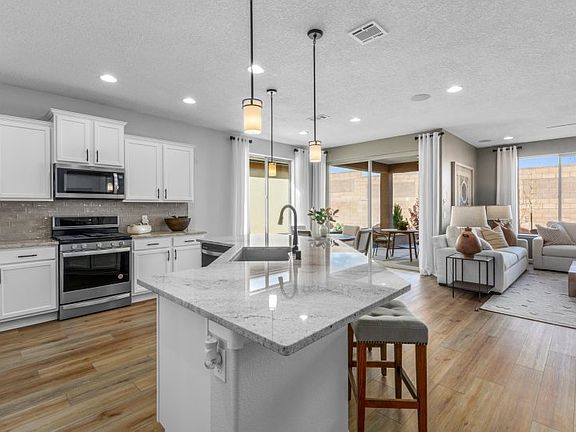 The Gateway s open floor plan seamlessly connects the kitchen, gathering room, and cafe areas.