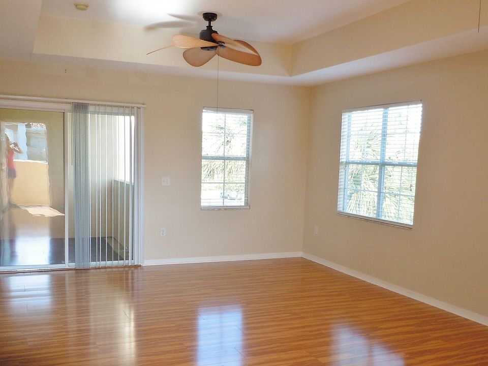 Volume ceilings; hardwood floors; designer 52" ceiling fans;