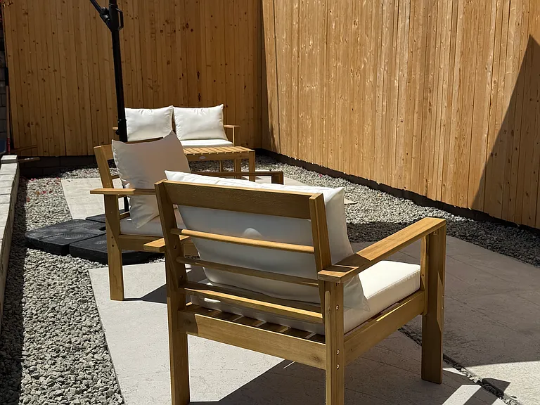 Backyard Outdoor patio accessible from backdoor / stairs of unit.