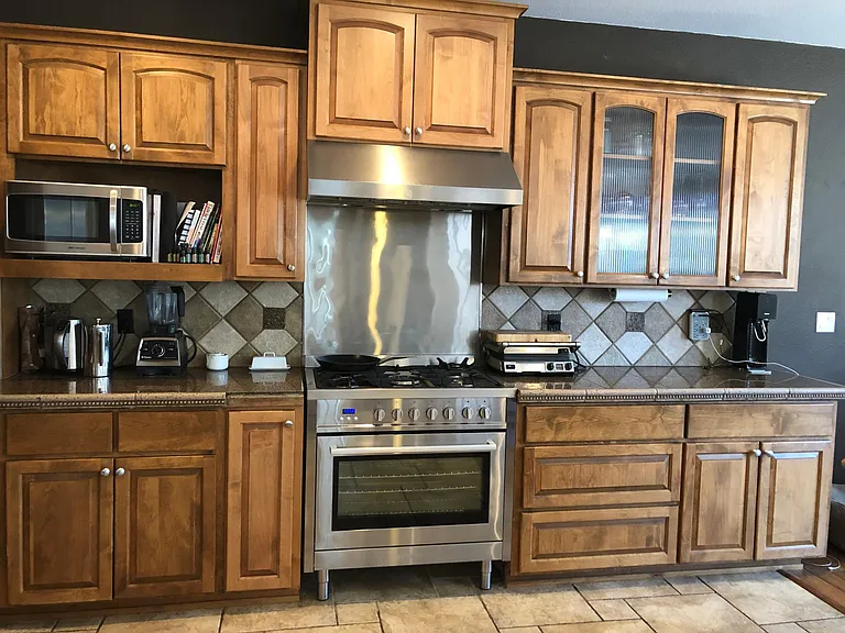High end gas stove and stainless appliances