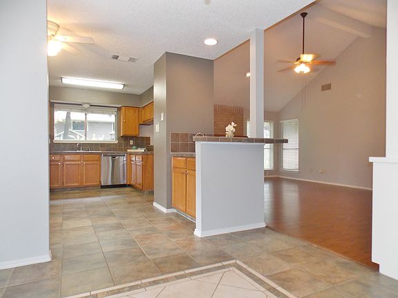 Bright, open kitchen, breakfast, living and dining.