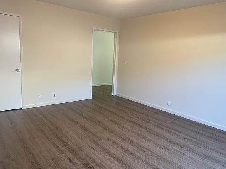 Example of new wood plank flooring installed throughout the apartment.
*This photo is only representative of the new flooring and not a photo of the apartment.
