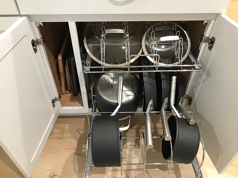 Pots, pans, cutting boards, and sheet pans.