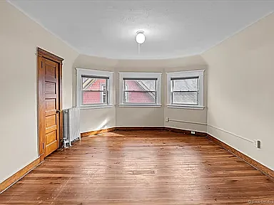 Apt 3 - living room, bright & spacious with a closet