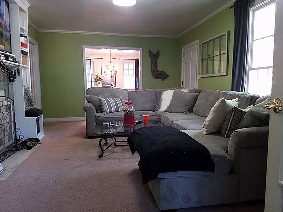 LR with media/bookcase/seats