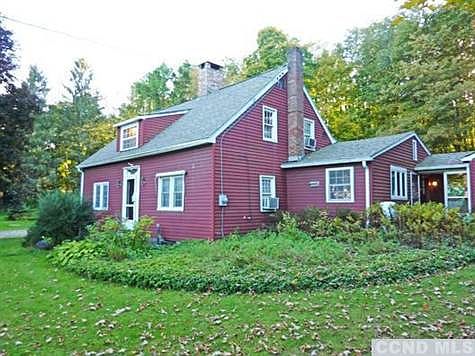 Front of house showing Kitchen wing and enclosed Breezeway.