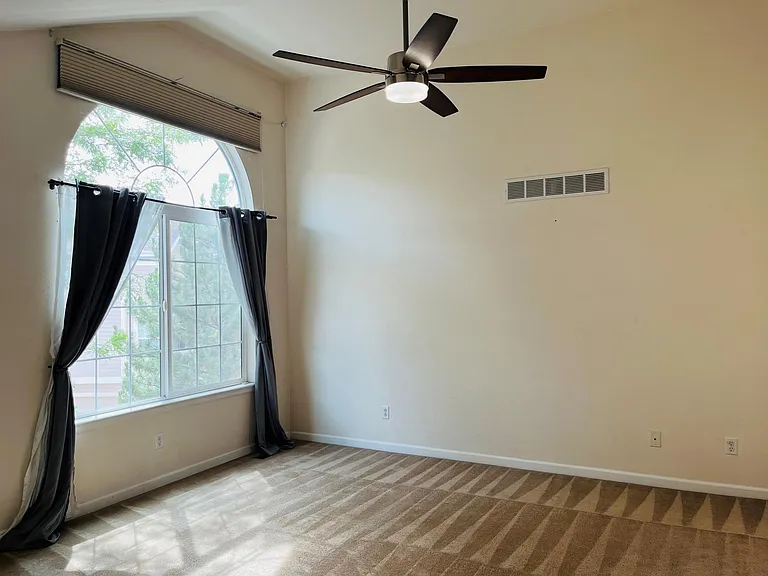 Beautiful spacious master bedroom with vaulted ceilings, large windows, large walk-in closet with custom shelving. Master bathroom with his and her sinks, spacious bathtub, linen closet