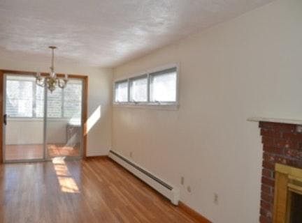 dining space leading to 3-seasons screen porch