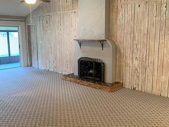 Spacious Great Room with driftwood accent wall