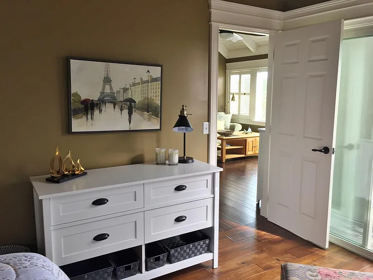 Queen bedroom #1 cabinetry. Sliding door to deck is to the right.