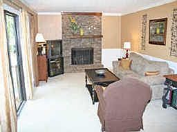 FAM RM HAS BRCK FP W/GAS STARTER, GLASS DOORS TO DECK 