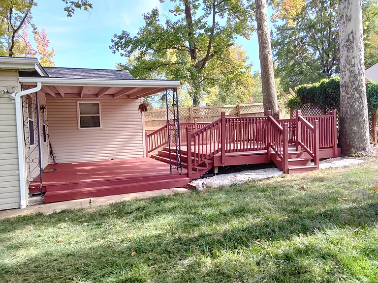 Plenty of room to spread out on this big deck that overlooks the spacious backyard.