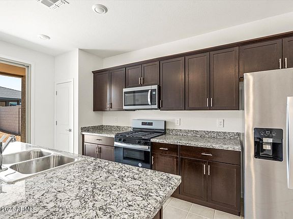 3rd image of 41605 W Sonoran Trail