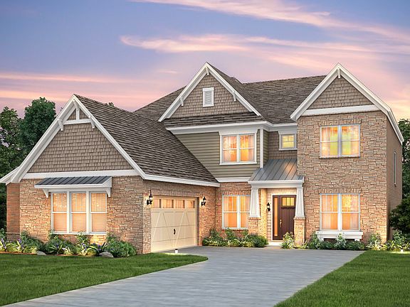Harrington Exterior 5 features stone, siding, shakes, covered front door and 2 car courtyard garage