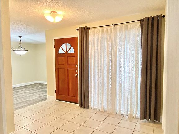 This is the entrance with the dining room in the back.