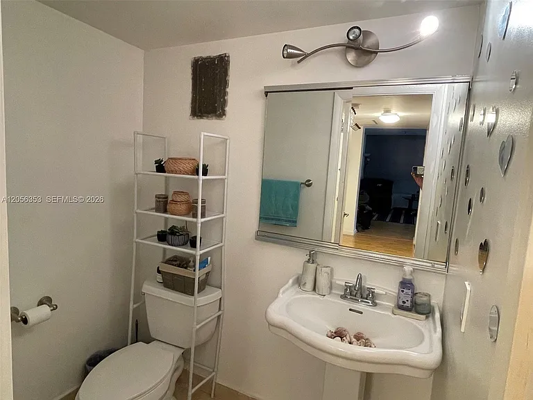 671 NE 195th St #207 — Photo 22