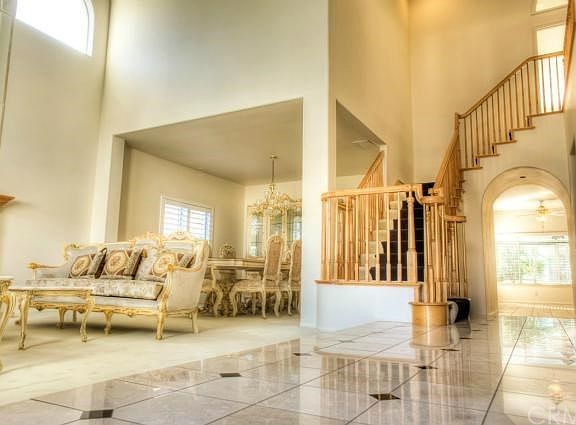 View of living room and formal dining room from the foyer.