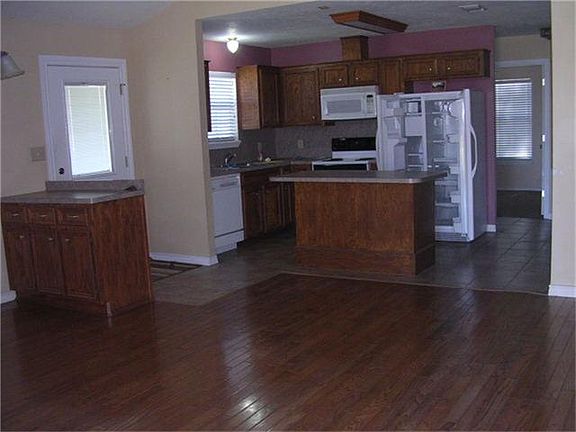  looking toward kitchen dining area from front door