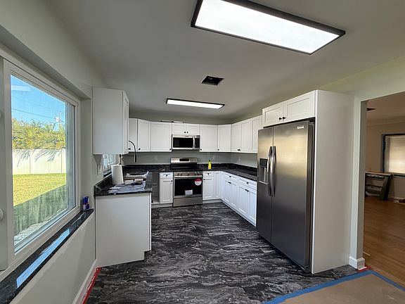 4th image of 8037 Elbow Ln N