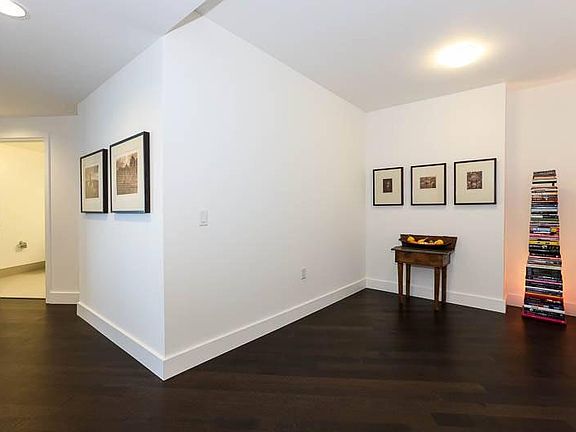 Foyer shows additional den space