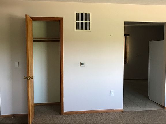 Coat closet in Livgrm and entrance to kitchen from livngrm