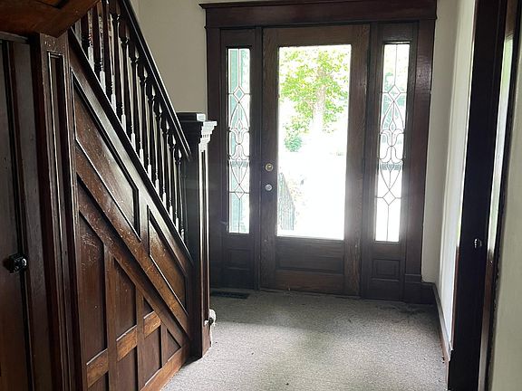 Entry with beautiful woodwork