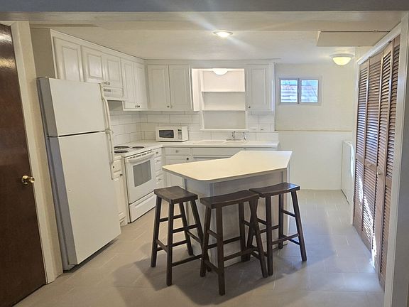 Remodeled full kitchen with pantry and washer and dryer.