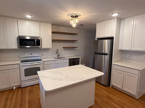 The island has an overhang, so it's great for pulling up a couple of stools.