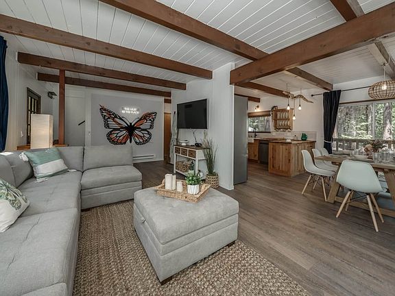 Living room open to dining area.