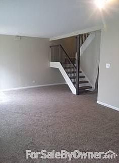 Family Room : Another angle of huge family room with view of stairs