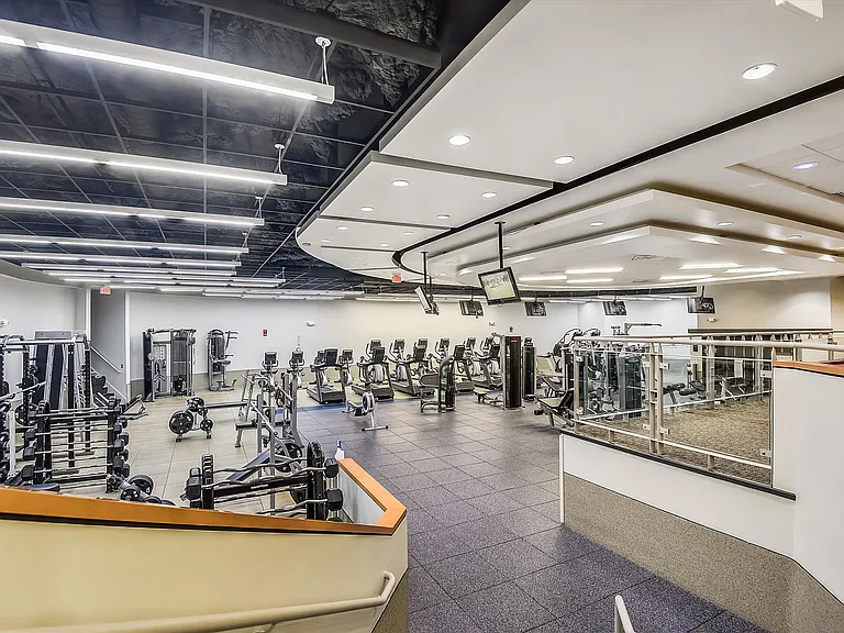 Huge sports center with tons of equipment and weights