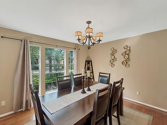Enjoying entertaining in the light and bright dining room.