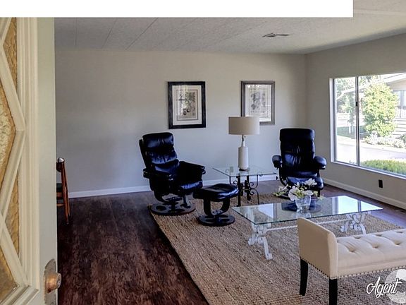 Enter the front door into this spacious living roo