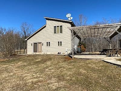 Side of guest house with outside patio
