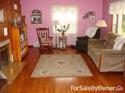 Living Room
						:
						Looking straight in from the formal dining room, refinished floor in 2012.