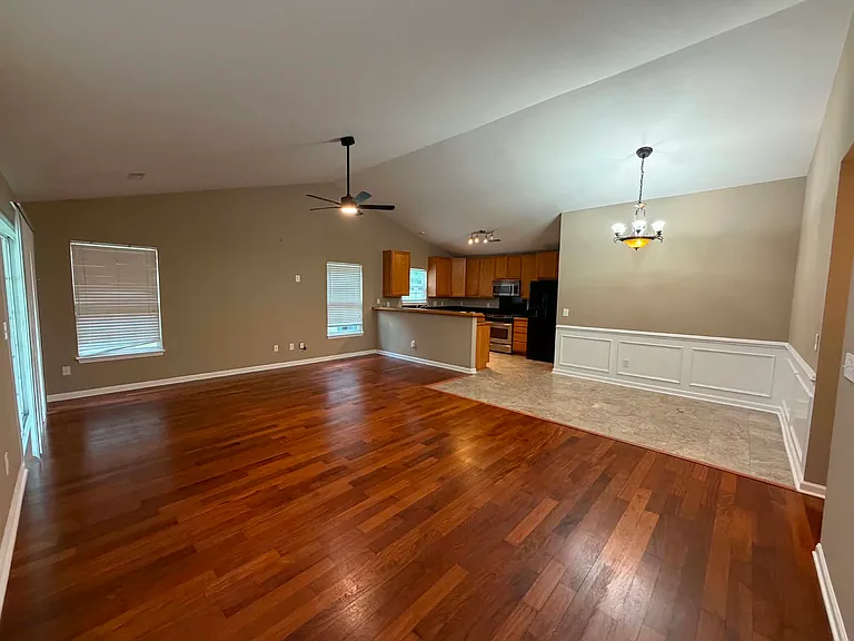 Welcome home! Step inside to an inviting open layout featuring brand-new hardwood floors throughout the living room, with elegant marble flooring flowing into the dining room and kitchen.