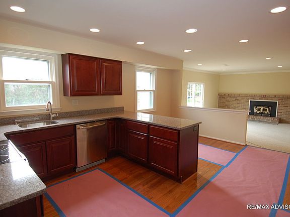 Cherry cabinets & granite countertops...