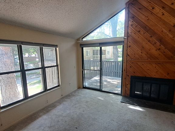 Living room, sliding glass door patio access.