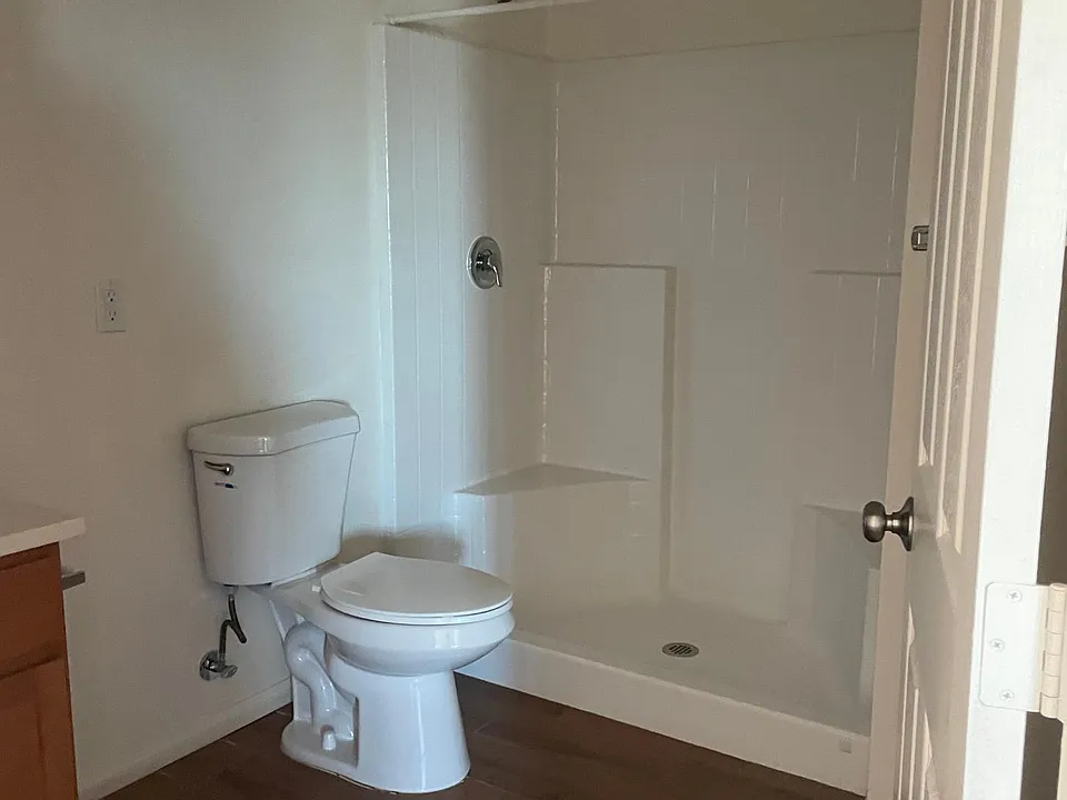Full bathroom in common area.
