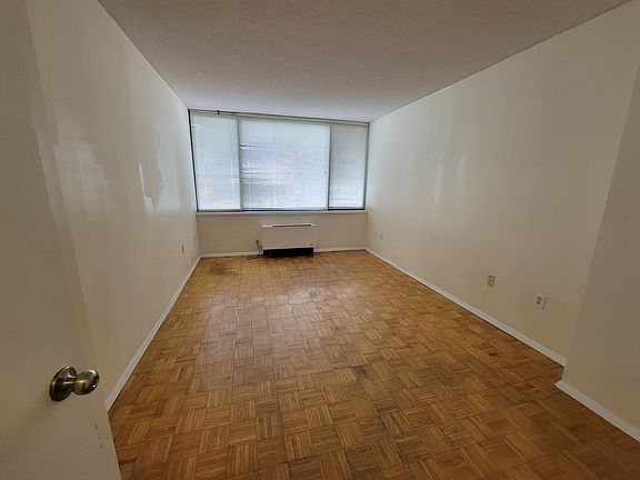 Bedroom. Faces East. View of Manhattan skyline.