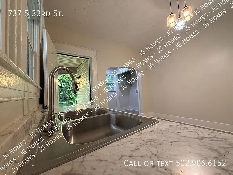 737 S 33rd St — Photo 12
