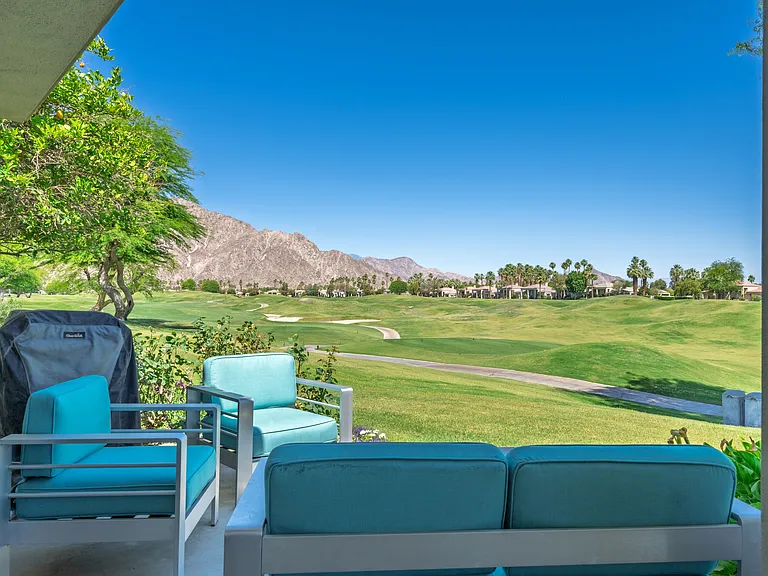 Outdoor patio seating overlooking the golf course