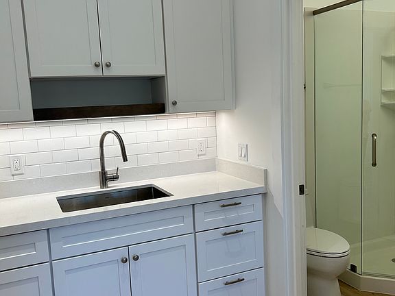 Studio Kitchen + Entry to Bathroom