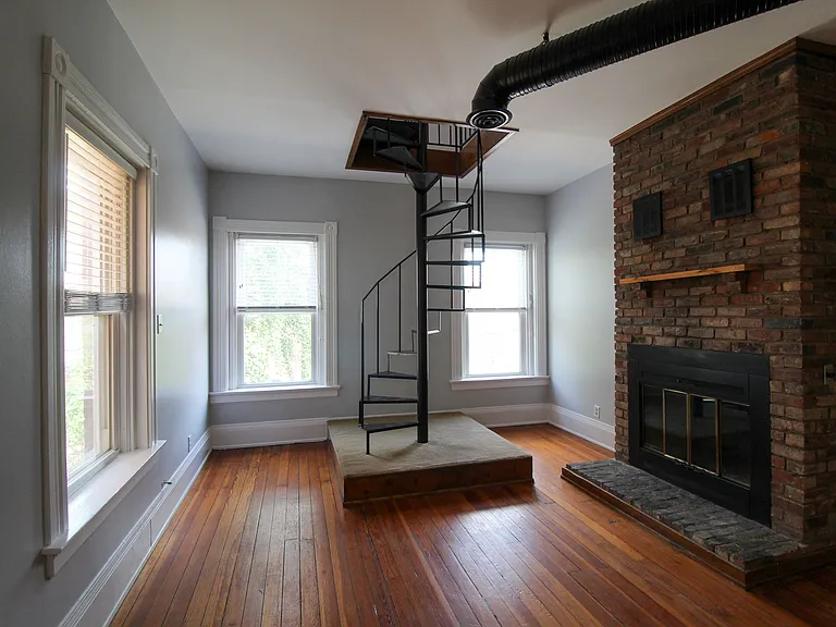 Decorative Fireplace and Spiral Staircase