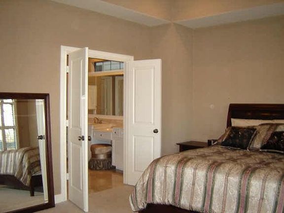 Spacious master with balcony and coffee bar w/frig. on 2nd level w/2 add'tl