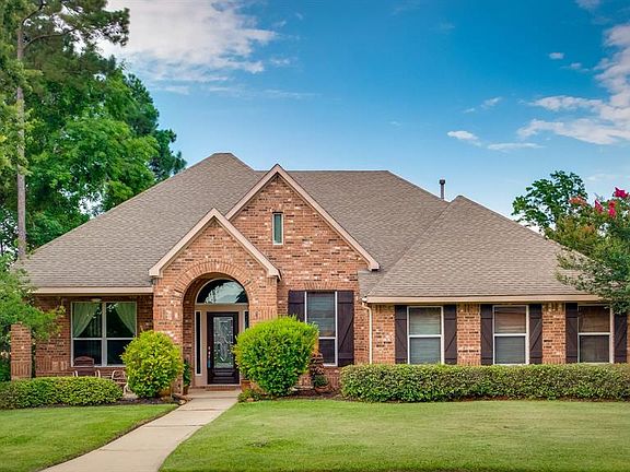 Beautifully maintained home in the gated waterfront community of Pebble Glen on The Lake