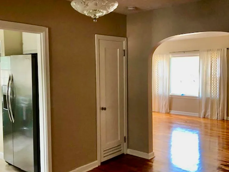 Dining room looking into living room