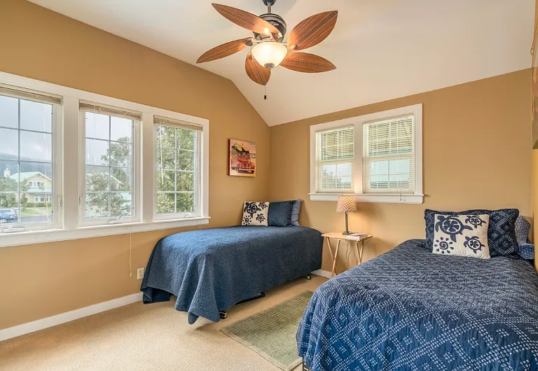 2nd bedroom with twin beds that can be attached together to create a king bed. There is an en-suite bathroom (not pictured)
