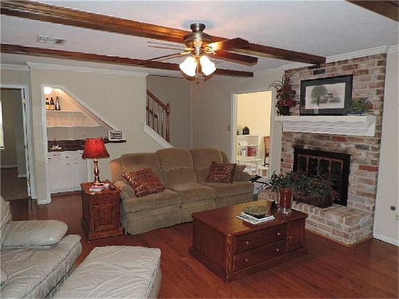 Another view of this cozy family room. Don't miss the wetbar hiding in the corner.
